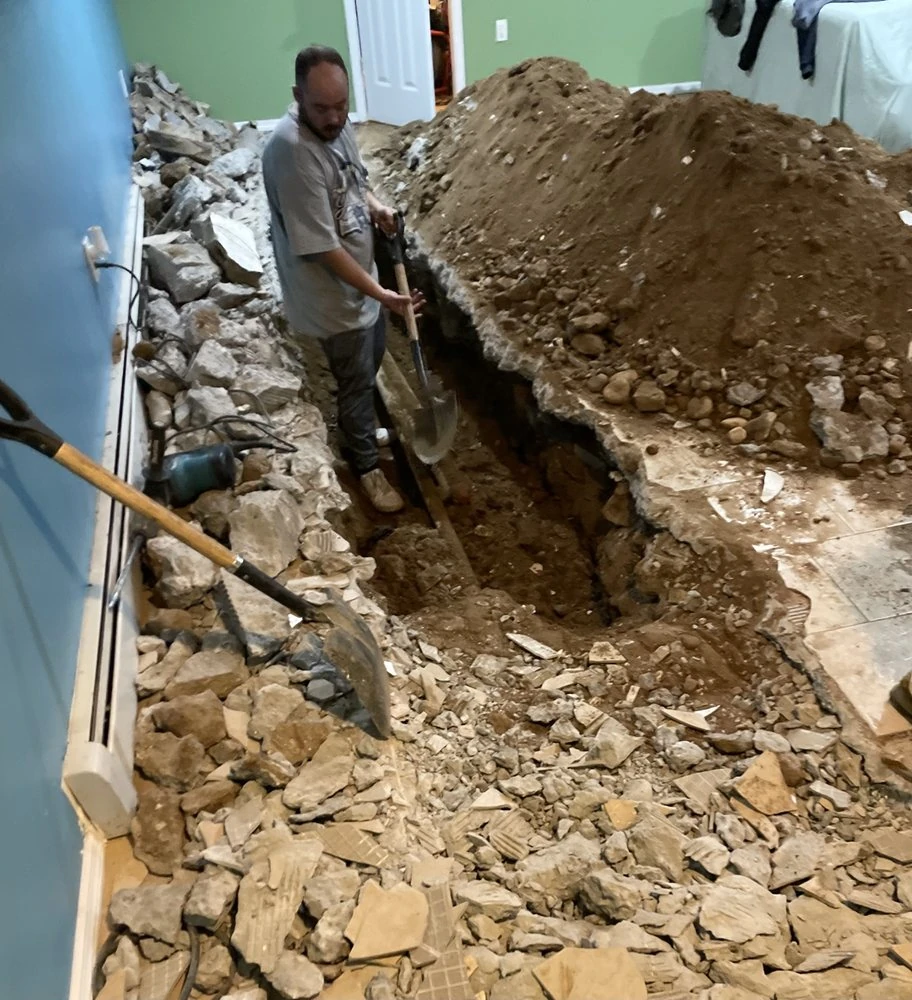 Excavated area during sewer-drain work